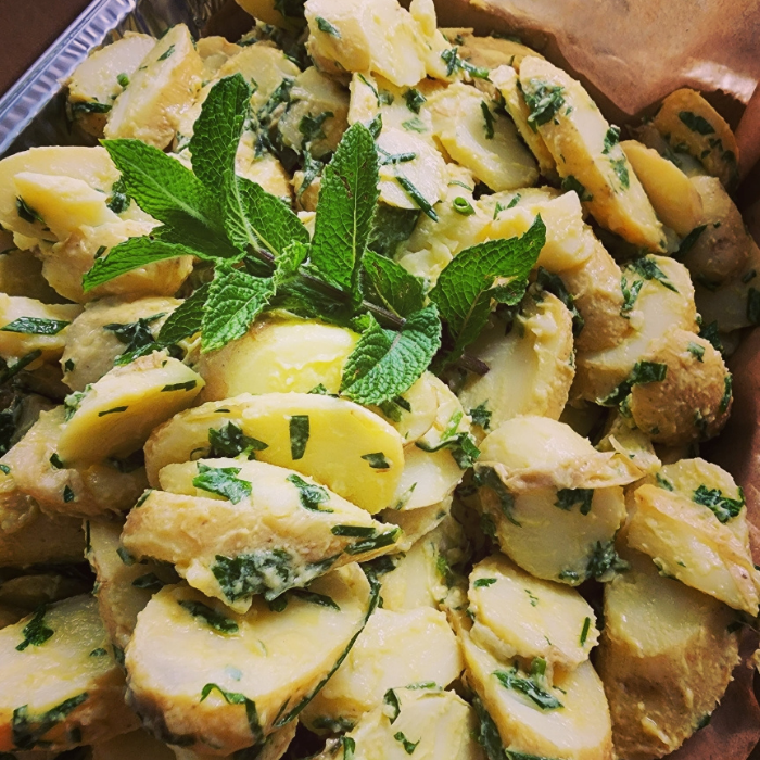 Kipfler potatoes with Lemon Oil Dijon Mustard & Fresh Herb Salad